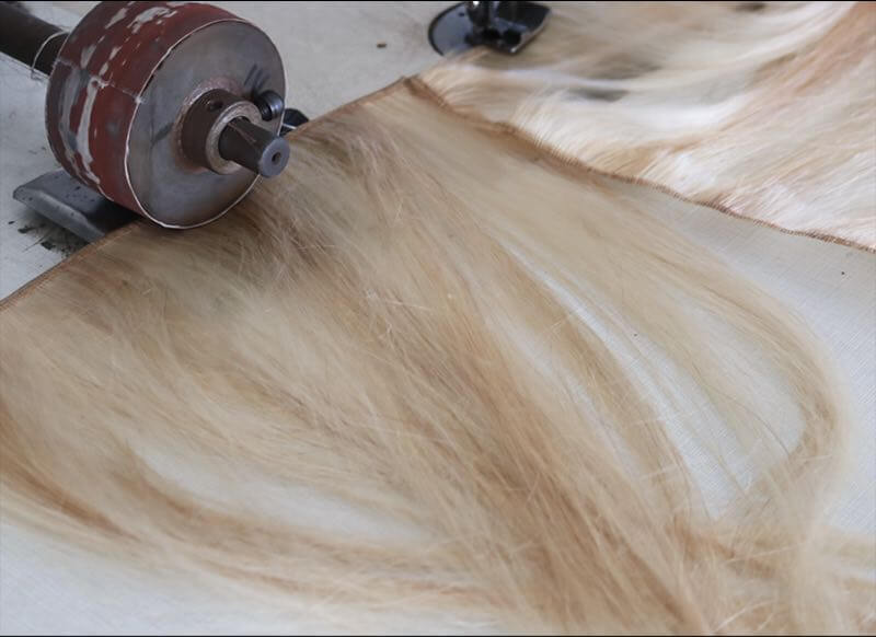 The machine weft we do flat and natural looking. The gentle processing to ensure healthy high quality products.